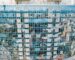 Street reflection on glass steel building facade, close view